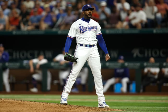 Texas Rangers relief pitcher Aroldis Chapman reacts after striking out Tampa Bay Rays designated hitter Harold Ramirez in the ninth inning Monday at Globe Life Field.